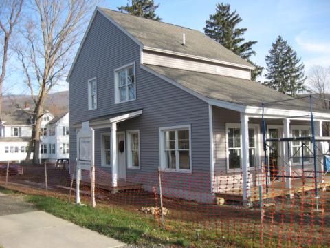 The house as it appears from near the corner of Cole and Maple